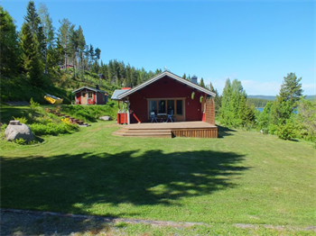 Bild Året runt stuga vid havet med egen båtplats